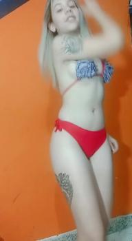 Naked Omegle girl gives her pussy a sensual massage on bed