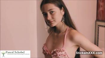 Kitty caressing her as she brushes her teeth