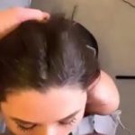 Laying down on a bed turns curly hair girl naked on OnlyFans show